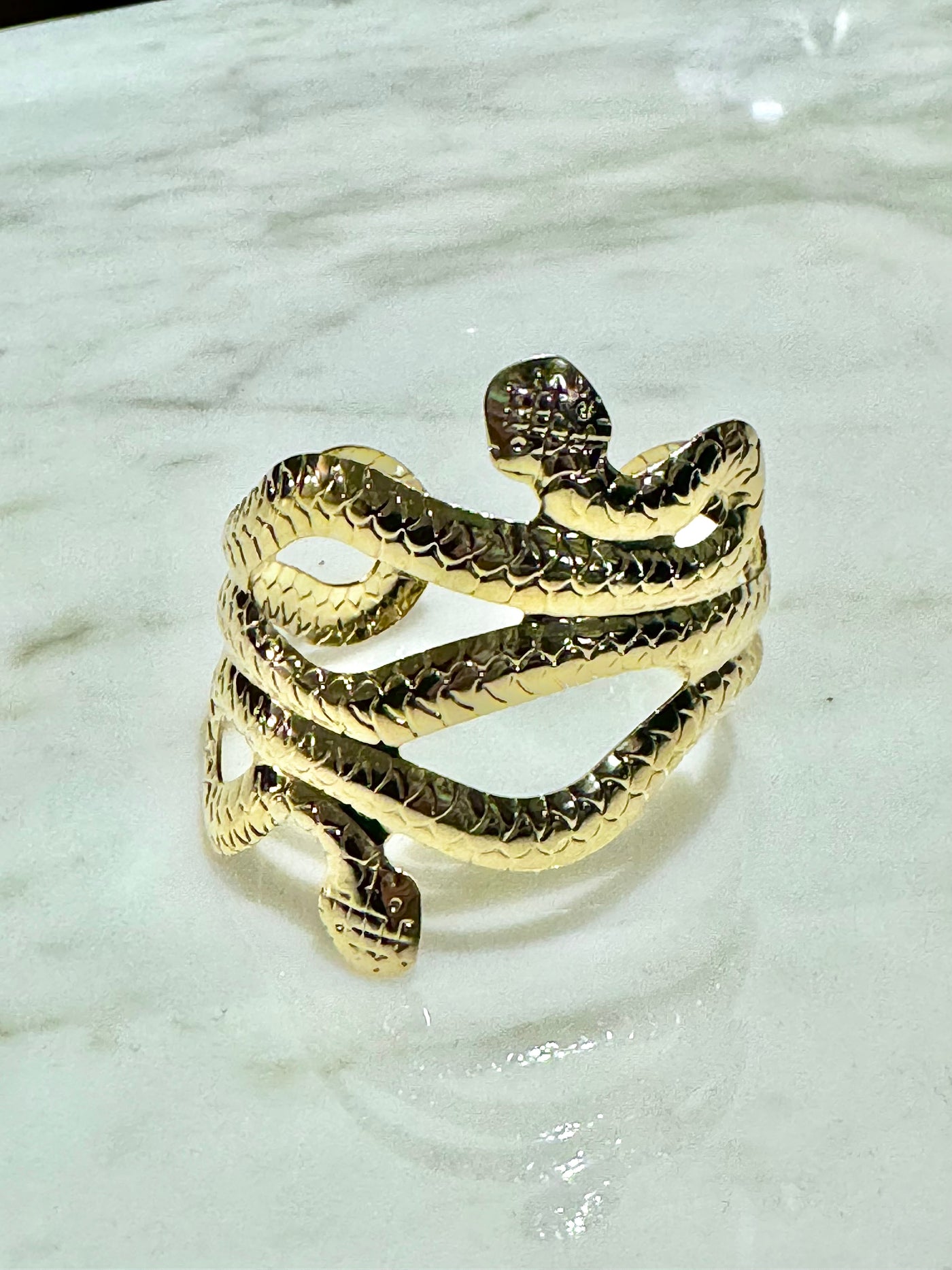 Gold wrist Snake